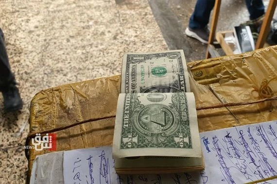ائتلاف المالكي: نية حكومية لتخفيض سعر صرف الدولار إلى 137500