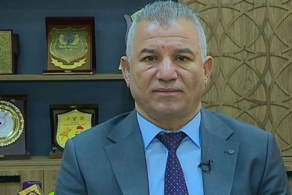 قوة أمنية تعتقل المتحدث باسم وزارة التجارة محمد حنون